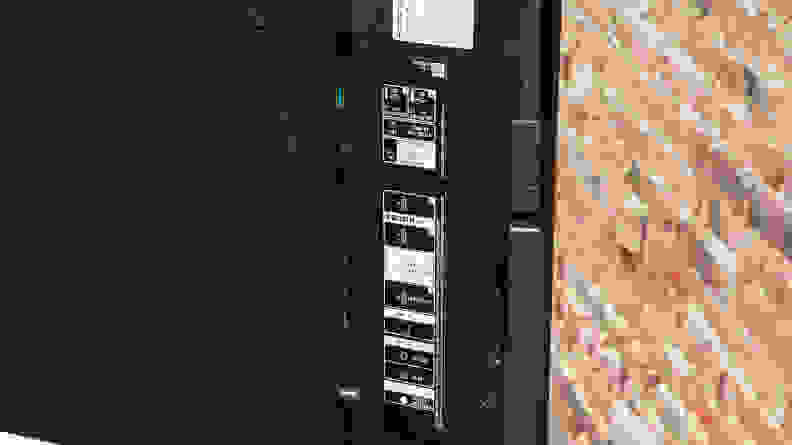 A close-up of the Sony A95L QD-OLED TV's connectivity inputs, located on the back of the TV's panel