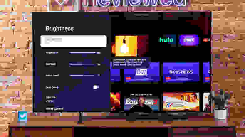 Brightness settings being adjusted on the Hisense 65-Inch Class U7 Series Mini-LED ULED television.