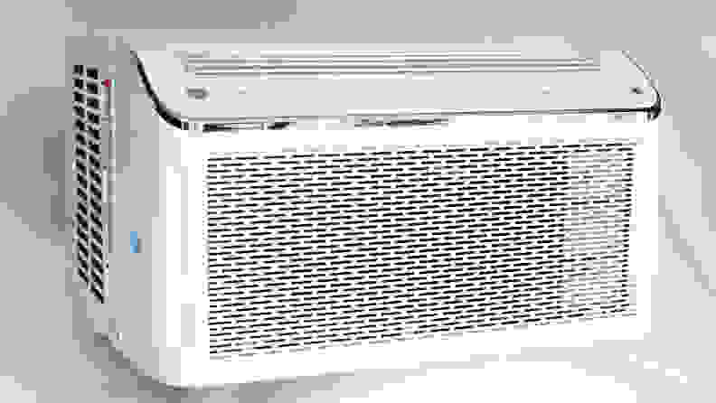 The white GE Profile PHC08LY, the best window air conditioner, is pictured in three-quarters profile.