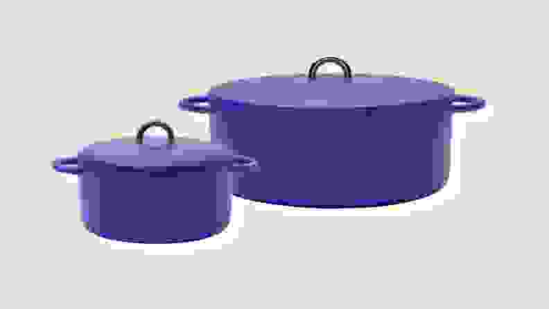 The 3.5-quart Dutch Baby cast-iron Dutch oven next to the 6.75-quart enameled cast-iron Dutchess Dutch oven, both in Blueberry color.