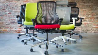 Several office chairs in a room