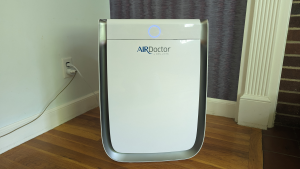 The Air Doctor Pro 3500i, one of the best air purifiers, is shown in a home.