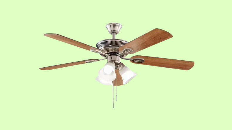 A Hampton Bay ceiling fan appears on green.