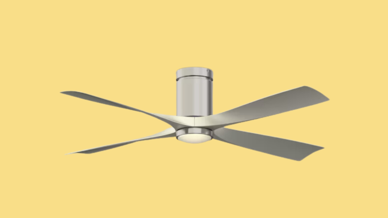 The Fanimation Studio Collection AireFlush, one of the best ceiling fans out there, is shown on a yellow background.