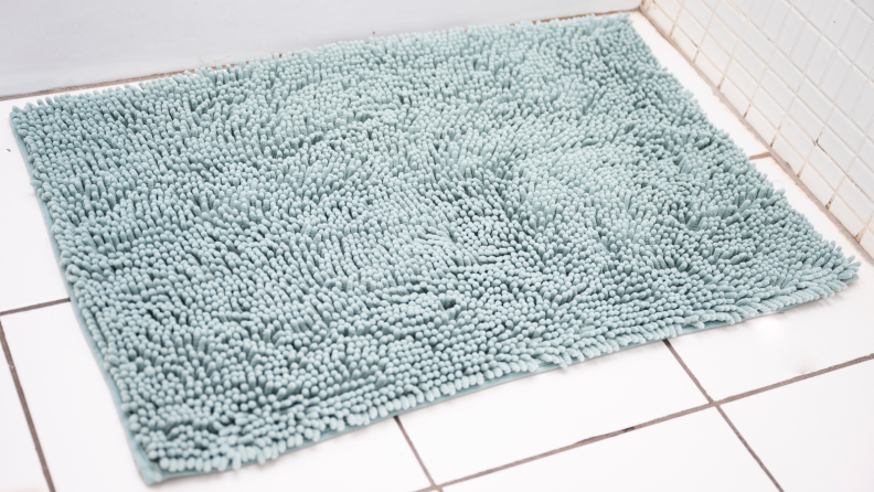 Bath mat on a bathroom floor.