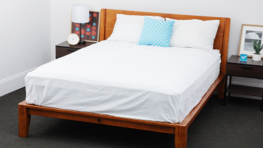 Brooklinen bed sheets are shown on a bed for testing in the Reviewed labs.