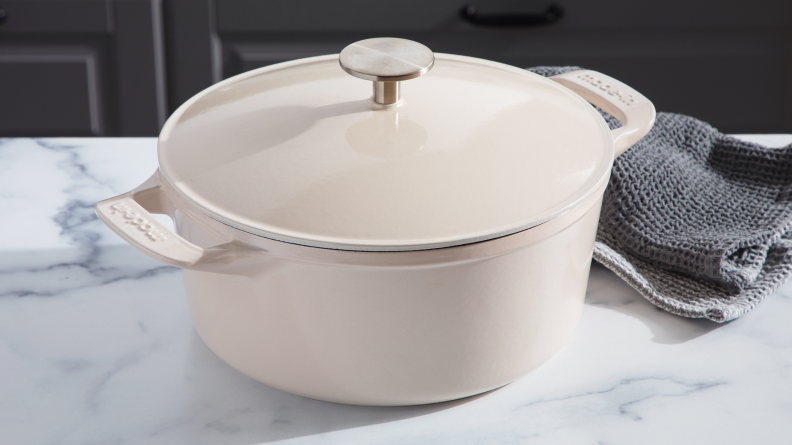 A white Made In Dutch oven on a white countertop