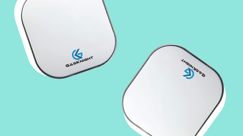 Two GasKnight natural gas detectors against a blue background.