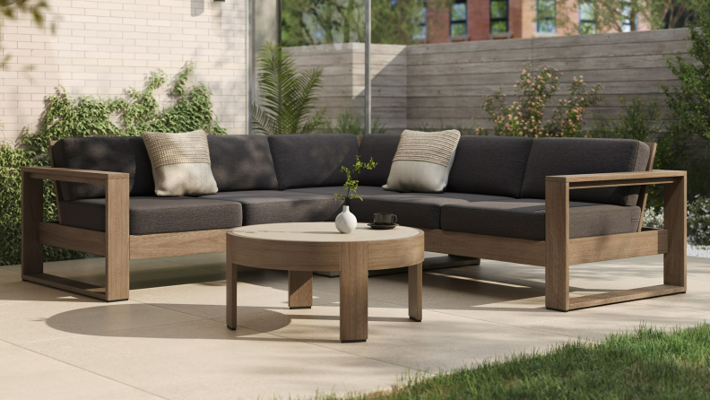 Portside Outdoor 3-Piece Sectional by West Elm in slate with round table